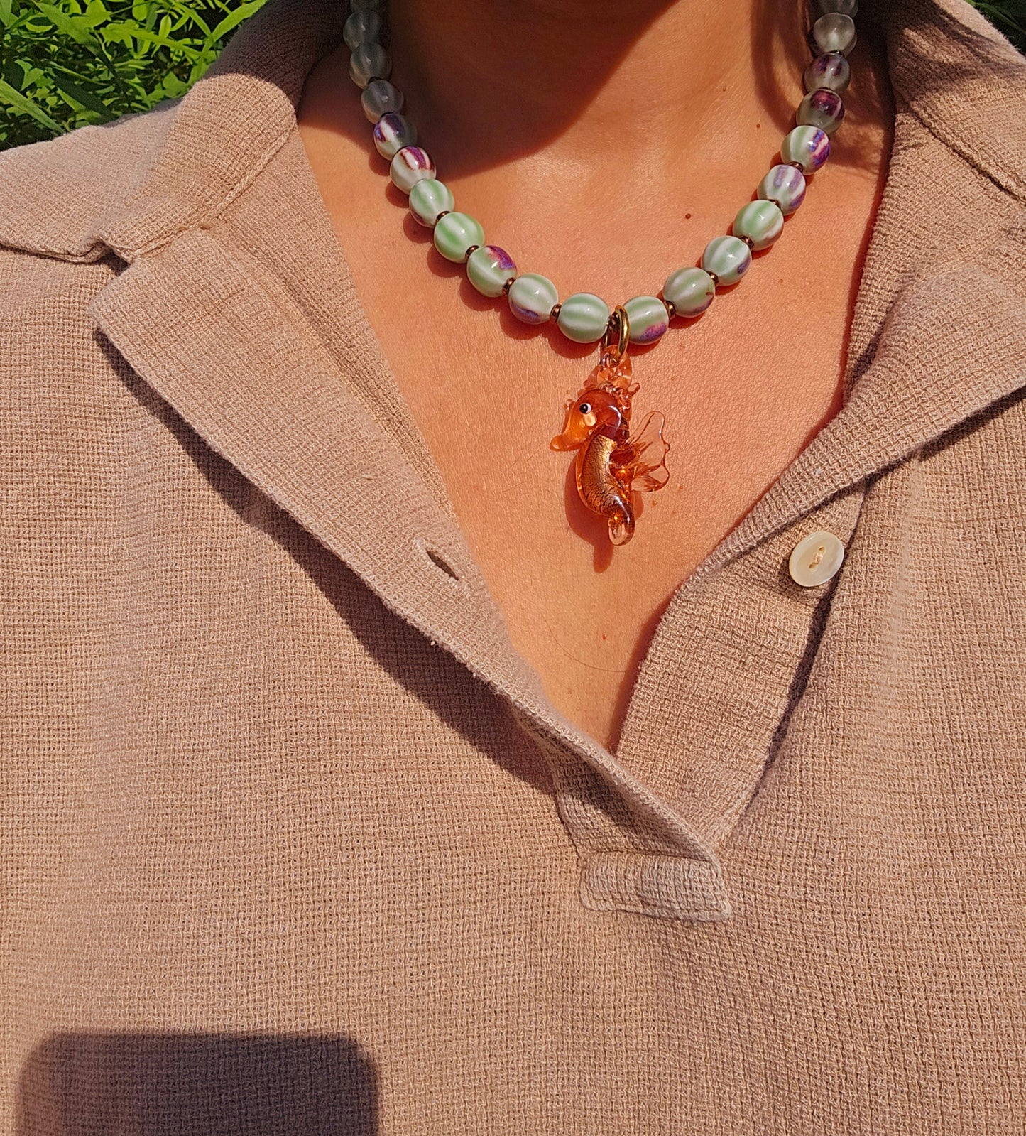 Brown seahorse glass pendant